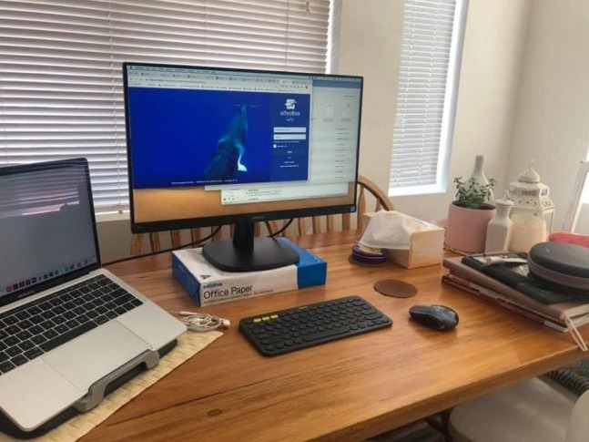 Teacher setting up an activity inside Crostini